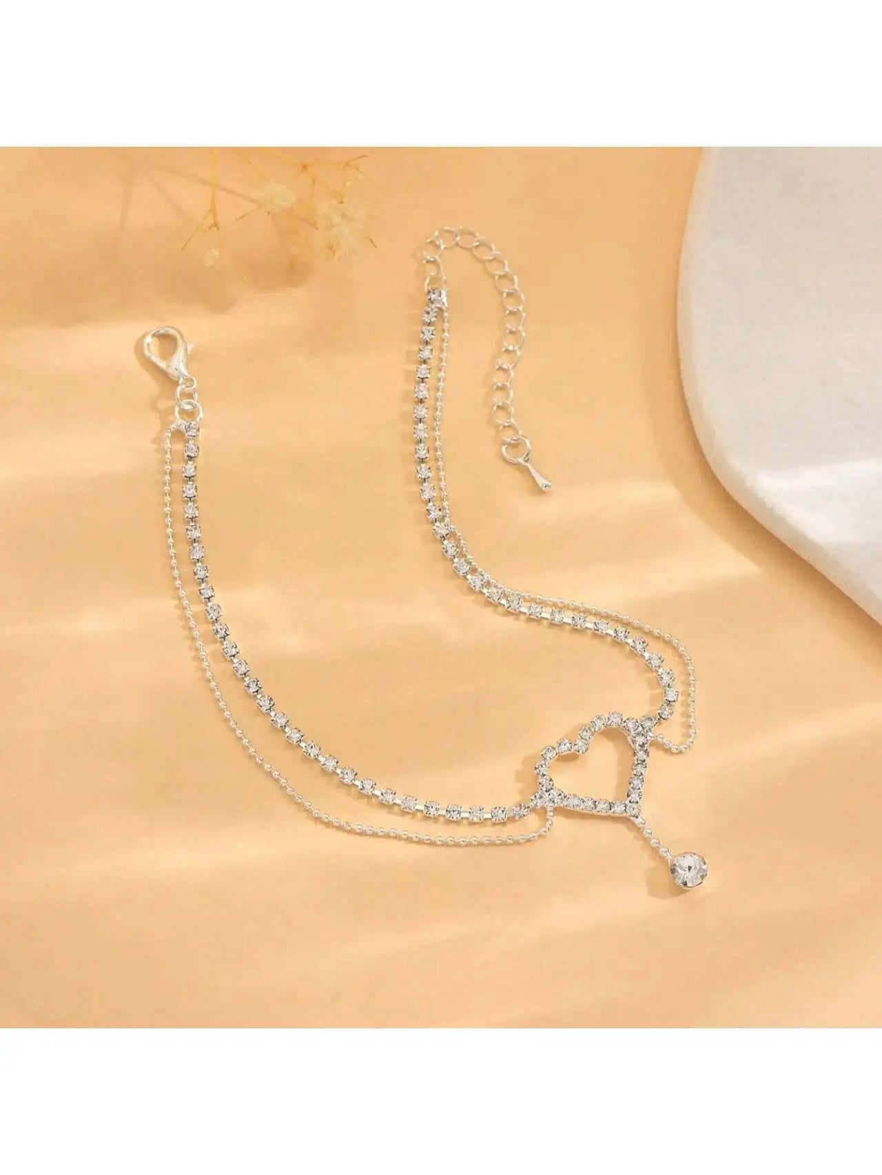 Exquisite and fashionable sparkling micro inlaid rhinestone hollow out love droplet pendant anklet suitable for parties