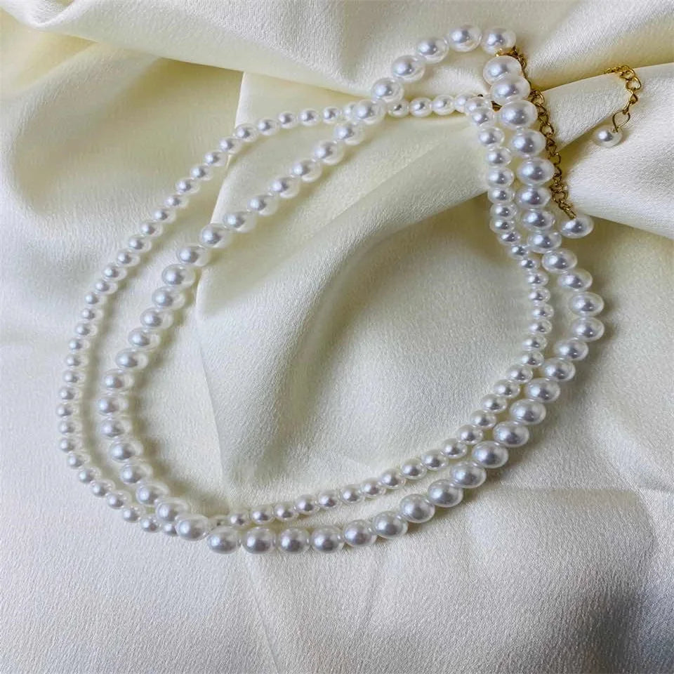 eManco New Imitation Pearl Necklaces Round Multi Size White Pearl Stainless Steel Necklace Women's Collarbone Chain