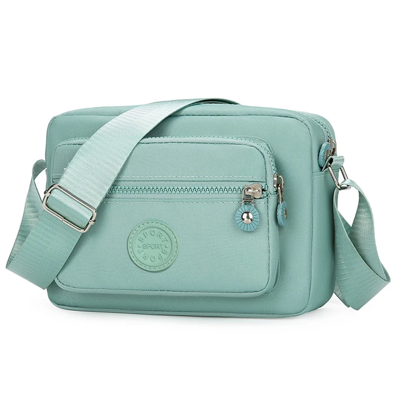 Neutral style handbag made of lightweight and simple nylon fabric, new single-shoulder women's bag. [The zipper direction is ran