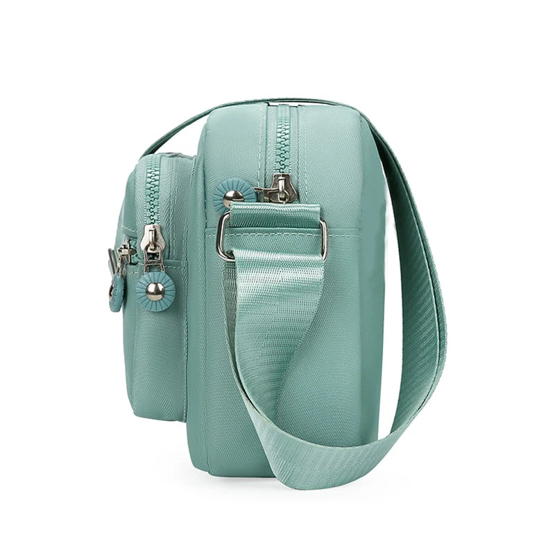 Neutral style handbag made of lightweight and simple nylon fabric, new single-shoulder women's bag. [The zipper direction is ran